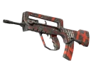 StatTrak™ FAMAS | Выживший (После полевых испытаний)
